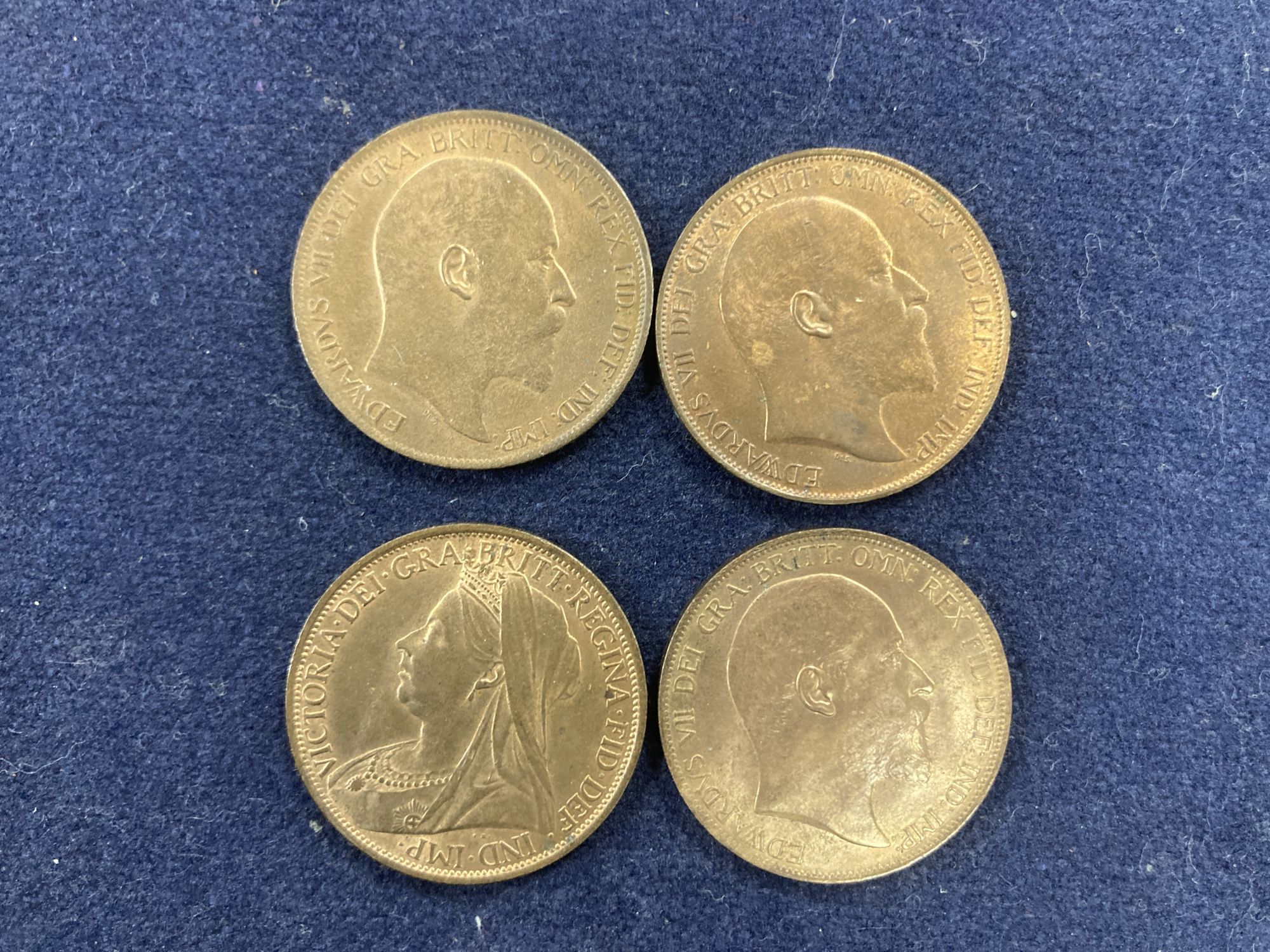 Victoria and Edward VII one pennies, 1897 UNC with much lustre, and three examples of 1902 all UNC with much lustre (4)